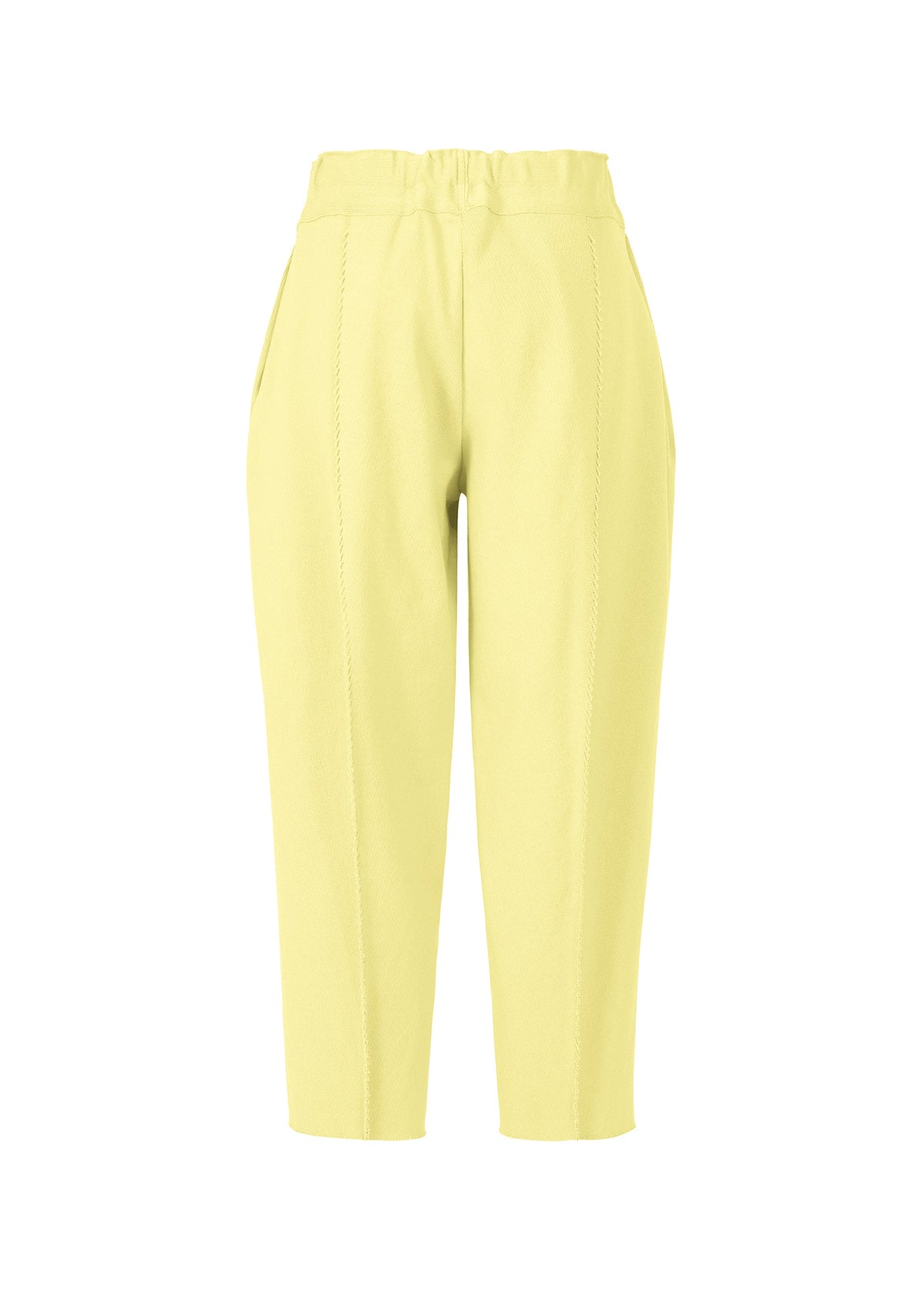 The CAMPAGNE pants by ISSEY MIYAKE are high-waisted and yellow with a tapered leg and side pockets, shown against a white background. Made from stretchy fabric, they feature stitched front seams and an elastic waistband for enhanced comfort. view 2 of 6
