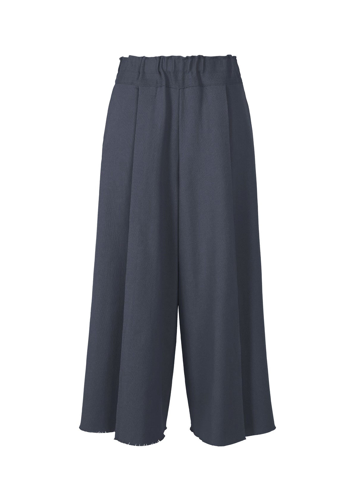 The CAMPAGNE pants by ISSEY MIYAKE feature a wide-leg culotte silhouette in navy, crafted from slightly textured A-POC material. Designed with a high, elastic waistband, these pants have loose, flowing legs and unfinished hems for an effortlessly chic look. view 1 of 6