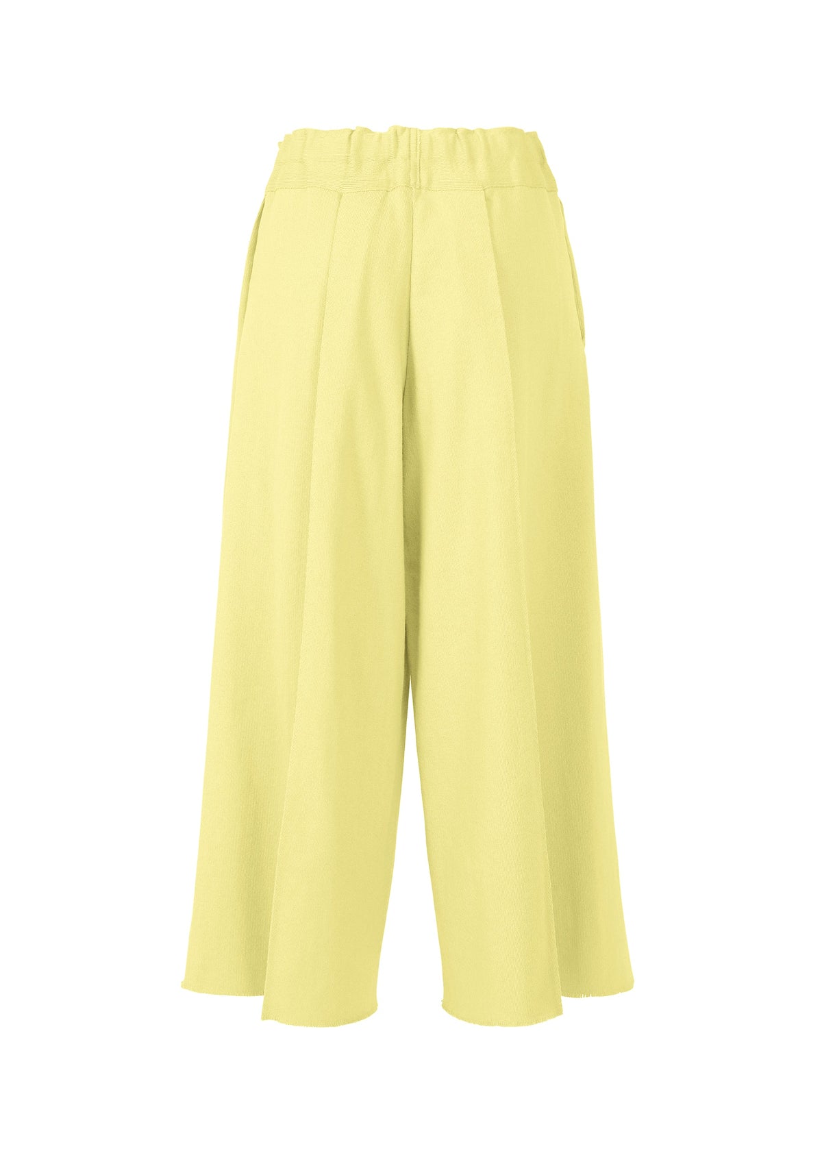 CAMPAGNE wide-leg, high-waisted yellow culotte pants by ISSEY MIYAKE, made from stretchy A-POC material with an elastic waistband and side pockets, displayed on a white background. view 2 of 6