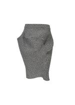 The FOUND STONE mini skirt by ISSEY MIYAKE features a textured gray, stone-inspired knit with an asymmetrical, sculptural design and irregular hemline, shown against a white background. - GRAY （no.12）