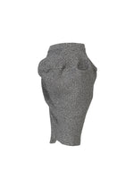 The FOUND STONE by ISSEY MIYAKE is a textured, gray asymmetrical mini skirt featuring stone-inspired knit and gathered draped detailing, shown on a plain white background.