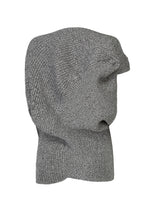 The FOUND STONE beanie by ISSEY MIYAKE is an organic gray knitwear hat, shown on a white background with a side view and the top slouching right.