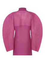 The ISSEY MIYAKE PANINI PULLED is a bright pink long-sleeved knit tunic with voluminous sleeves and a high neckline, crafted from a luxurious wool-alpaca blend on a plain white background.