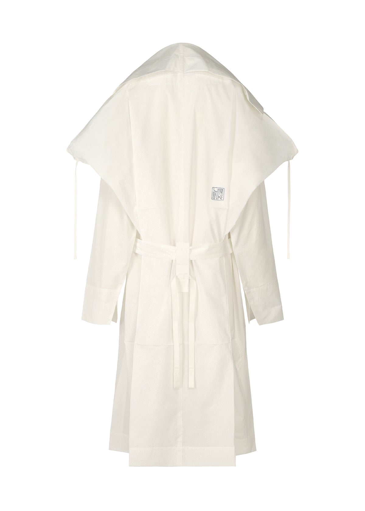 The FOLDING COAT by ISSEY MIYAKE is a white, long-sleeve robe featuring a wide oversized hood, tied waist belt, and a small rectangular back label. Inspired by a lightweight kimono jacket, it is shown against a plain white background. view 3 of 15