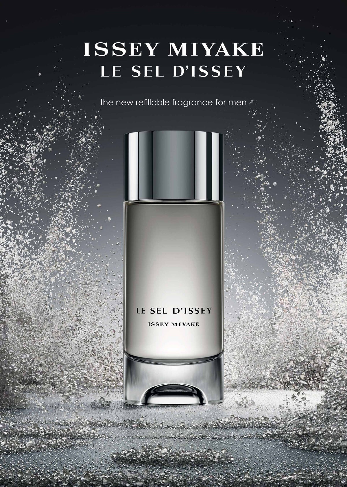 Zoomed view A 150mL bottle of ISSEY MIYAKE PARFUMS LE SEL EAU DE TOILETTE for men stands upright, featuring sleek silver accents and enveloped by dynamic sprays of water. Text above introduces it as a new refillable salt eau de toilette.