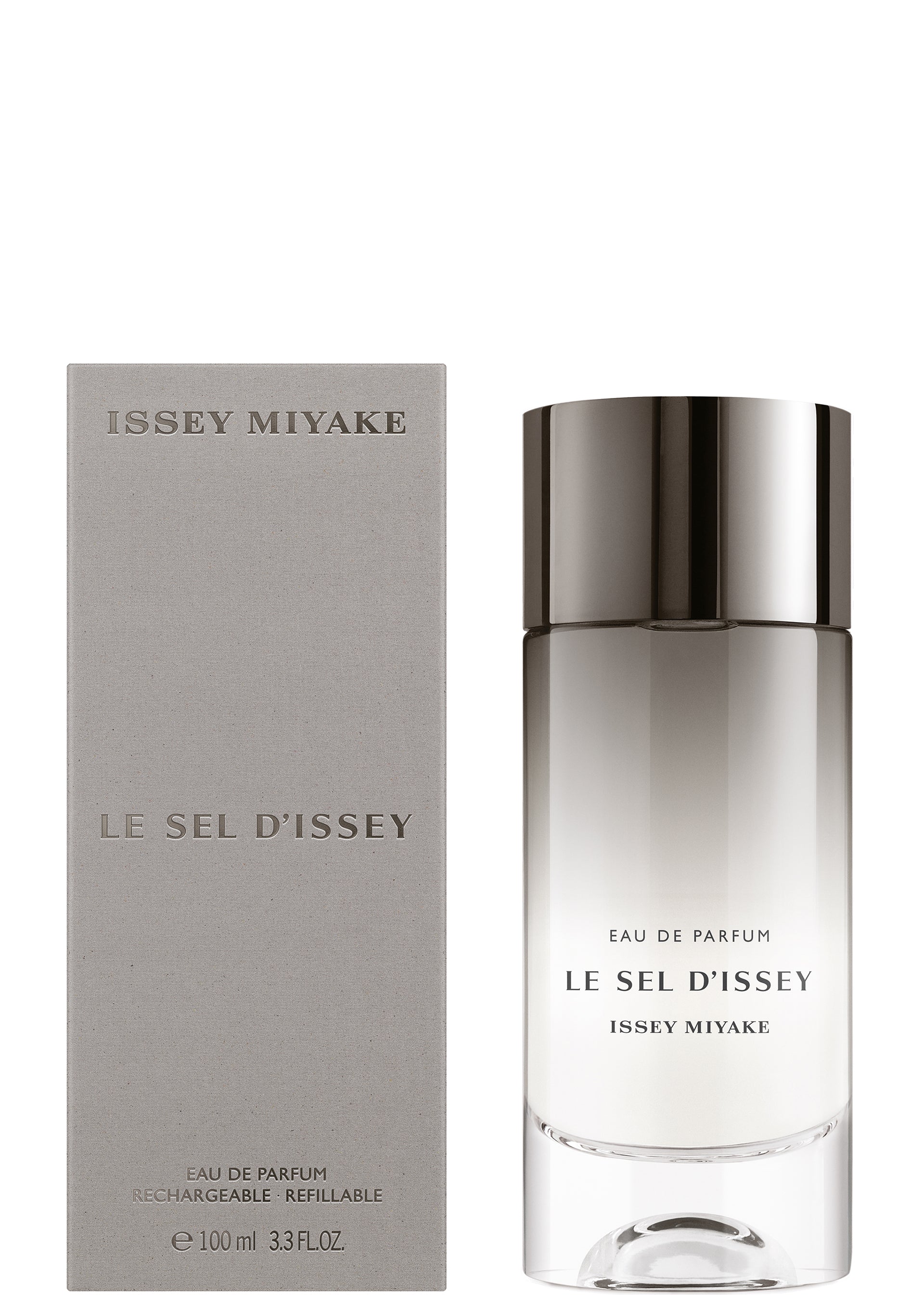 Zoomed view A bottle of LE SEL D'ISSEY EAU DE PARFUM 100mL by ISSEY MIYAKE PARFUMS sits beside its sleek light gray box, both with silver and gray text, reflecting the fragrance’s fresh marine seaweed and salty notes.