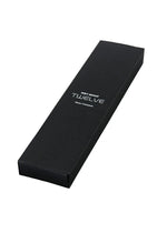 A black rectangular box with “TWELVE” in white on the lid and smaller text, from the ISSEY MIYAKE WATCH TWELVE series designed by Naoto Fukasawa, shown closed on a plain white background.