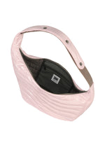 The ENGRAVE BAG by IM MEN is a shiny light pink sculptural bag featuring waved patterns, a wide adjustable shoulder strap, snap buttons, an open zipper showing a dark interior, and a label inside.