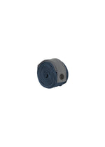 The IM MEN GURU GURU is a rolled-up blue and gray fabric belt with handmade pleats and a black button snap, displayed against a white background.