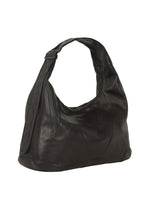 The IM MEN ELEMENTS LEATHER BAG is a large, slouchy black luxury leather bag with a wide adjustable shoulder strap and subtle stitched detailing, shown against a plain white background.