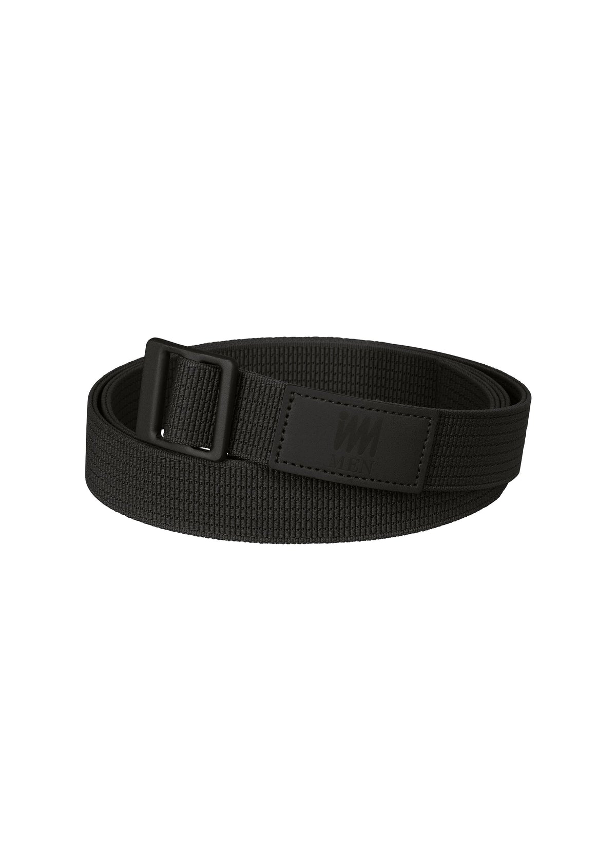 The IM MEN FRICTION BELT is a black woven elastic belt with a rectangular adjustable buckle and a black leather patch near the buckle, shown coiled on a white background. view 1 of 6
