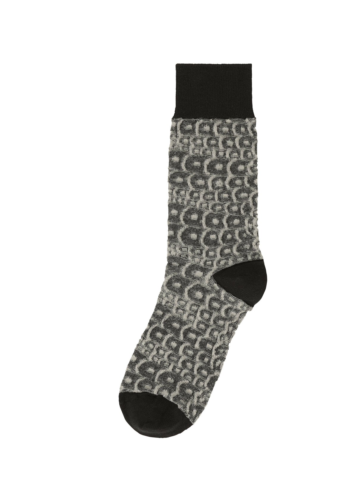The IM MEN UROKOMON SOCK is a single gray sock with black cuff, heel, and toe, showcasing an abstract geometric pattern inspired by ceramics. Displayed on a white background. view 1 of 4