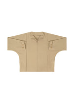 The IM MEN FLAT jacket in beige features long, wide sleeves, buttoned cuffs, a wrinkle-resistant finish, and a front zipper, shown laid flat on a white background.