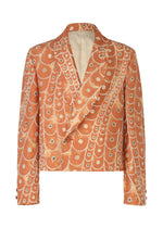 The IM MEN UROKOMON is a cropped orange short jacket with a bold, scale-inspired design, double-breasted front, peak lapels, and buttoned cuffs. - RED （no.24）