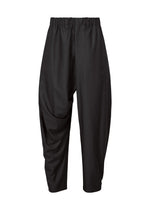The IM MEN SWING BLACK harem pants feature a loose silhouette, gathered elastic waistband, and slightly tapered legs. Made from wrinkle-resistant fabric, these black pants are shown on a white background. - - (no.01)