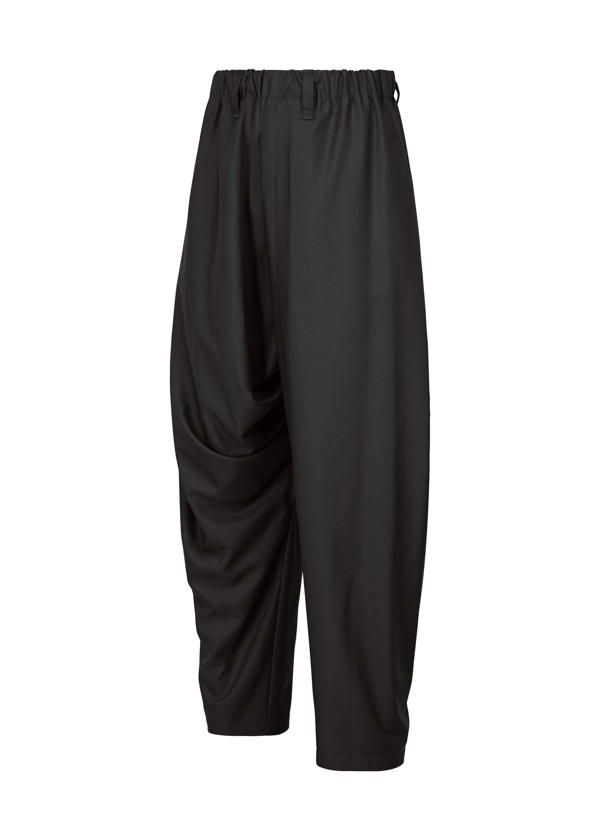 The SWING BLACK pants by IM MEN feature a loose fit, cropped length, elastic waistband, and asymmetrical draping in wrinkle-resistant fabric, shown against a white background. view 3 of 7