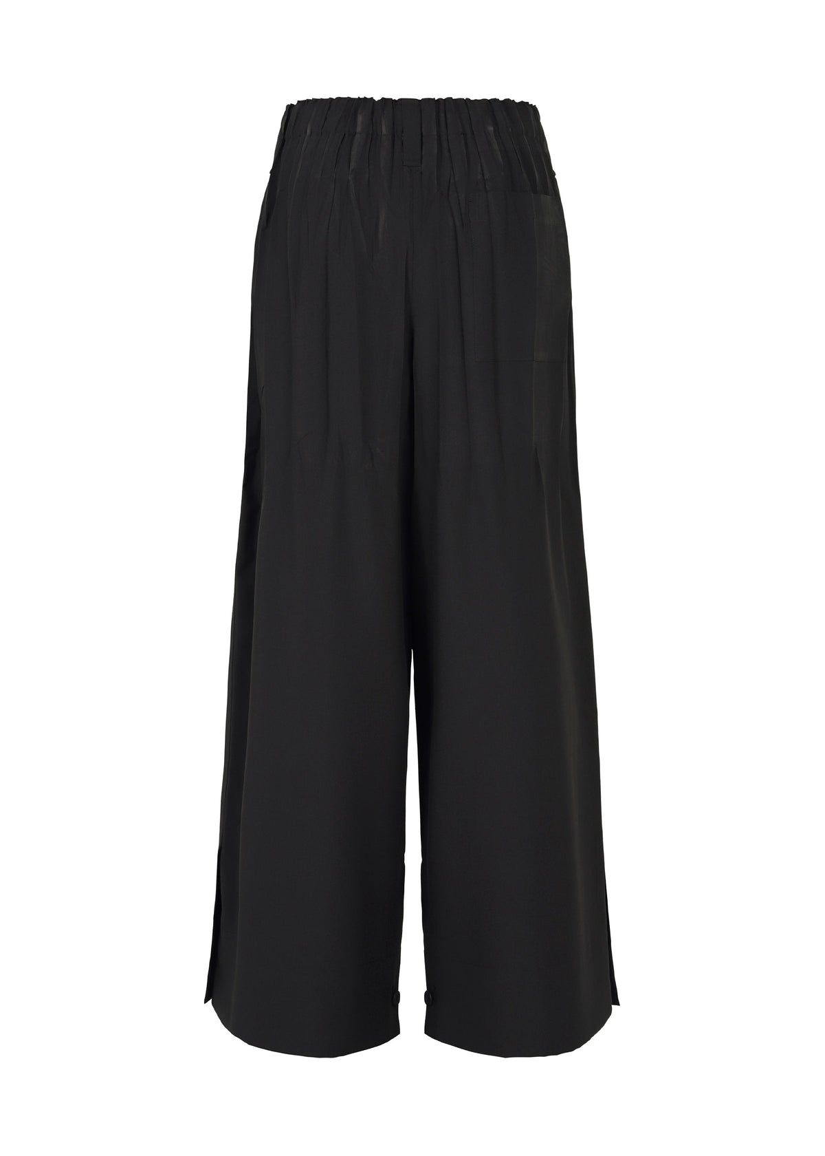 IM MEN's WAFT BLACK wide-leg culotte pants feature an elastic waistband, subtle pleats, and small side slits at the mid-calf hem. Shown from the back against a white background, they're crafted in wrinkle-resistant, linen-like fabric. view 2 of 7