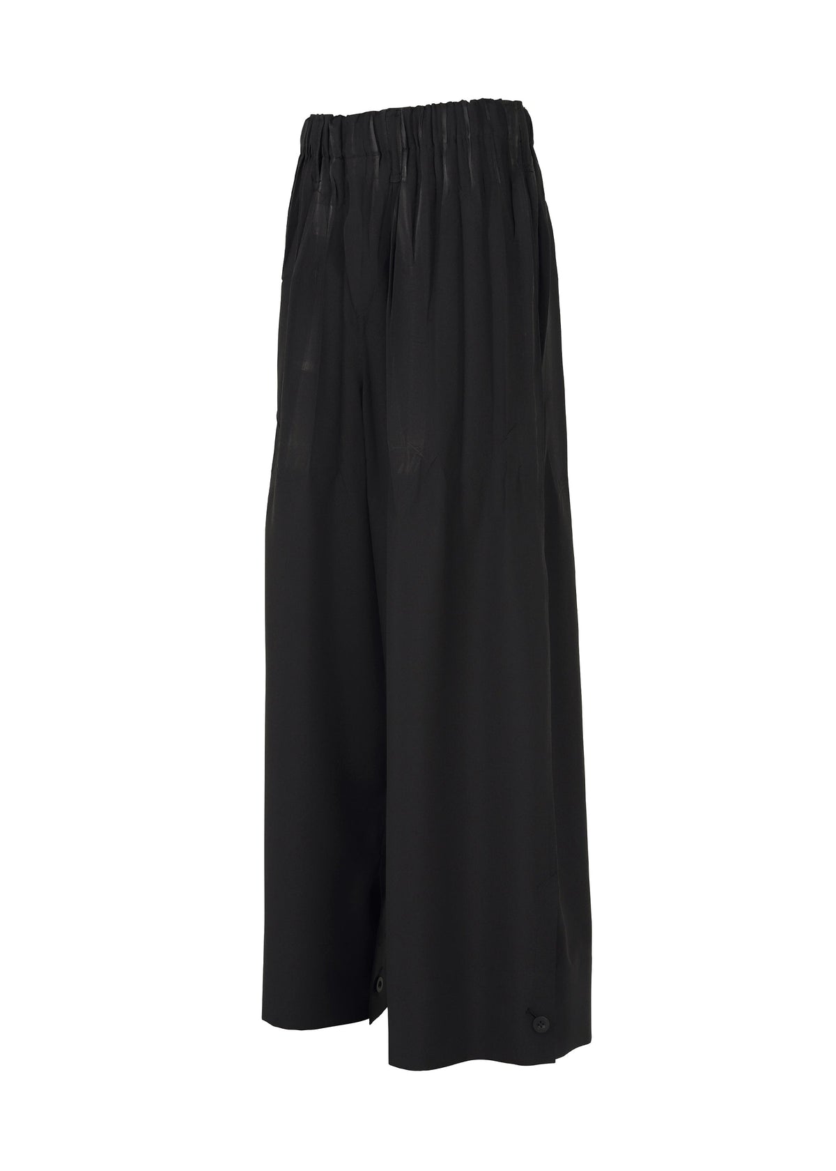 The IM MEN WAFT BLACK culotte pants feature a linen-like texture, elastic waistband, loose fit, and mid-calf length, shown on a white background. view 3 of 7