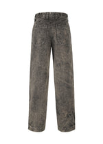 Back view of IM MEN ELEMENTS high-waisted, wide-leg jeans in faded black with unique color-fading, large patch pockets, and belt loops.