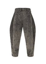 IM MEN’s ELEMENTS jeans feature a high-waisted, faded black denim with wide, curved legs. Distinct seam details and thick cotton fabric give these jeans a sculptural, avant-garde silhouette and unique color-fading effect.