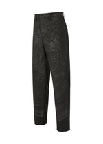 The IM MEN KAIYU black pants feature a subtle glossy swirl pattern inspired by ash glaze ceramics, with front button and zipper closure, belt loops, and a straight-leg cut. Displayed against a white background.