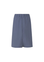 IM MEN’s NAVY BOTTOMS are high-waisted, loose-fitting blue pants with a breathable fabric, elastic waistband, and front overlap detail, shown against a white background. - DARK BLUE （no.73）