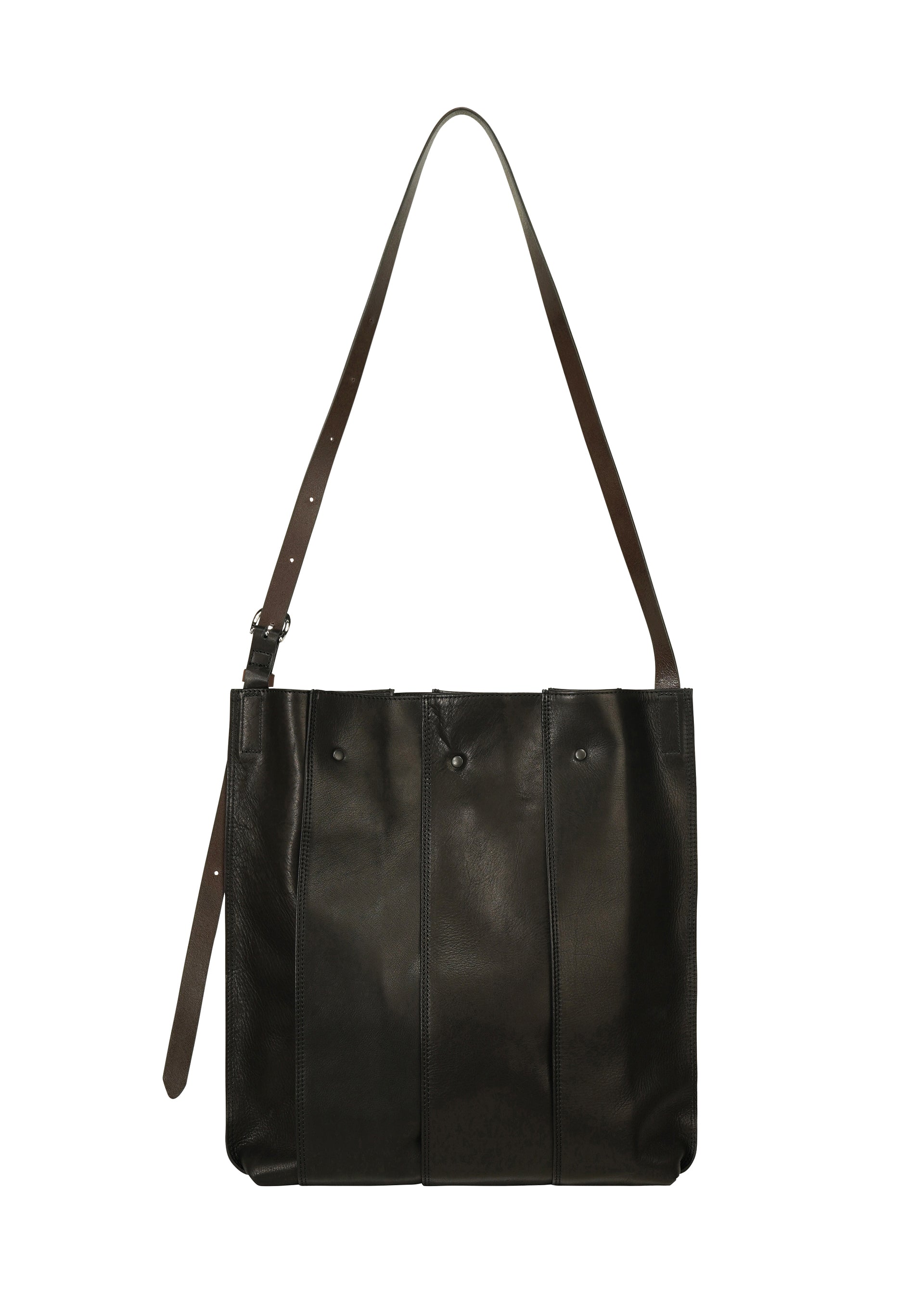 Zoomed view Introducing the LEATHER PLEATS by IM MEN—a classic black, natural leather shoulder bag designed with three vertical pleats, a long adjustable brown strap, and secure snap closures. Perfectly sized for a 13-inch laptop, it blends stylish versatility with practical functionality.