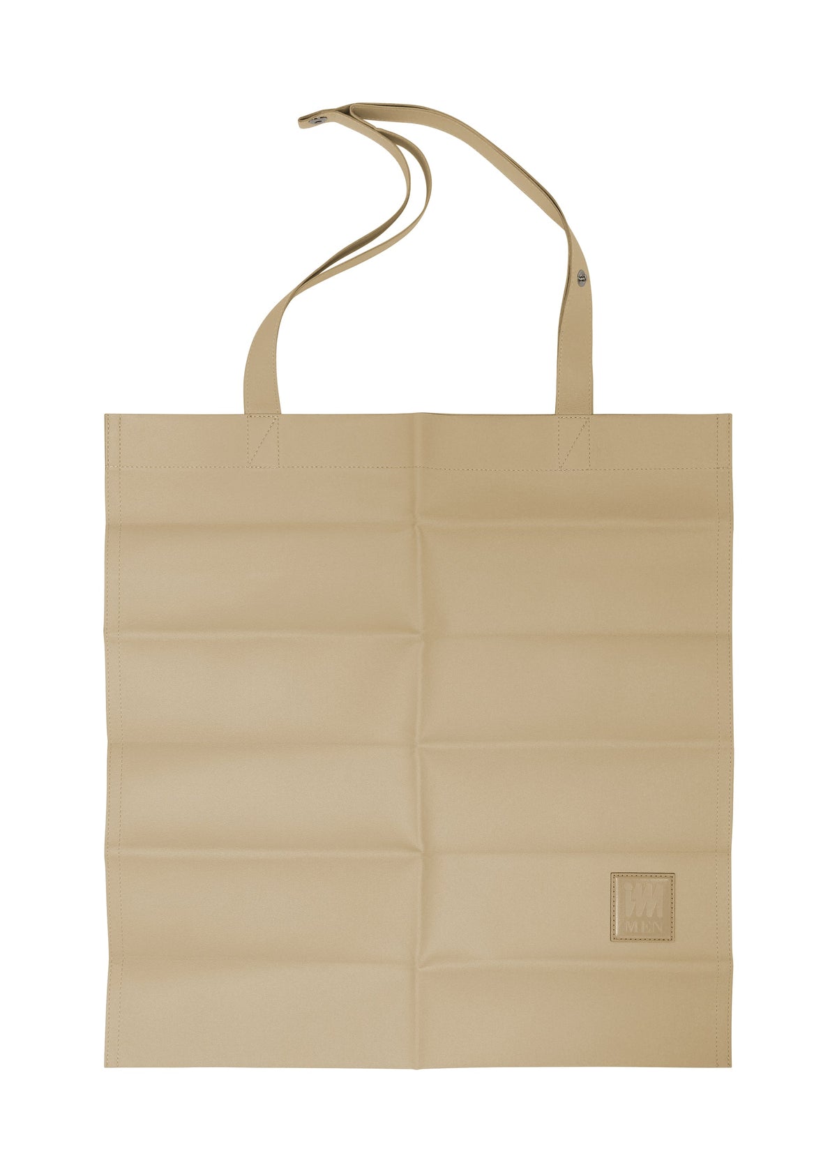 Beige polyester suede PATA PA tote by IM MEN with two handles, stitched squares, logo patch, and an extra strap with snap button on one handle, shown laid flat. view 2 of 12