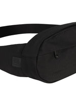 A close-up of the IM MEN CUMMERBUND BAG, a black fabric waist bag featuring a zipper, displayed against a white background. Its compact size and sleek design evoke a subtle cummerbund motif, blending practicality with understated style.