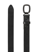 The OVAL belt by IM MEN is shown close-up in black genuine leather, featuring a rectangular matte black buckle, a pointed tip, and an adjustable design. The belt also includes a loop and a single black button detail near the buckle.