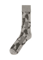 The IM MEN KASURI SOCKS feature an abstract black brushstroke pattern on gray yarn-dyed fabric, displayed against a white background. - LIGHT GRAY （no.11）