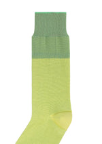 The IM MEN GRADATION SOCKS feature a single sock with a gradient from dark green at the cuff, to medium green mid-sock, to light yellow-green at the foot, shown on a white background.
