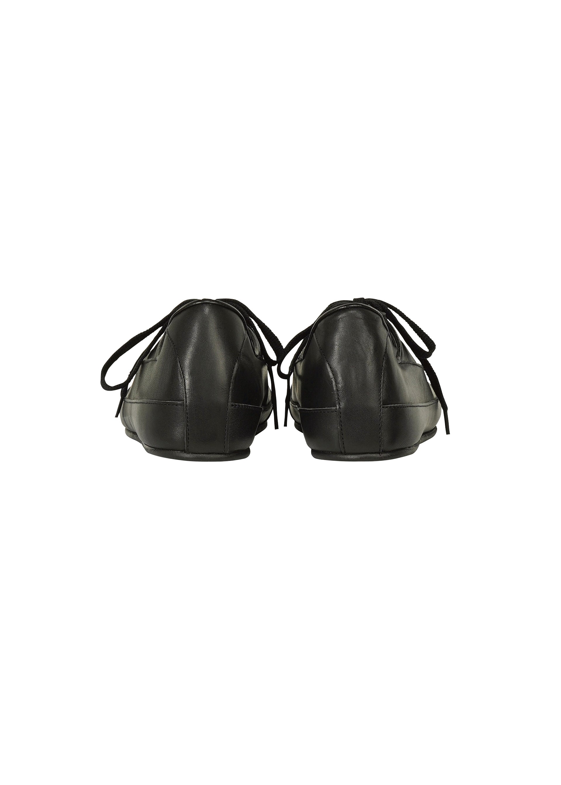 Zoomed view A pair of FLIPPER black leather dress shoes by IM MEN, expertly crafted from supple leather, are shown from the back with black laces visible against a plain white background.