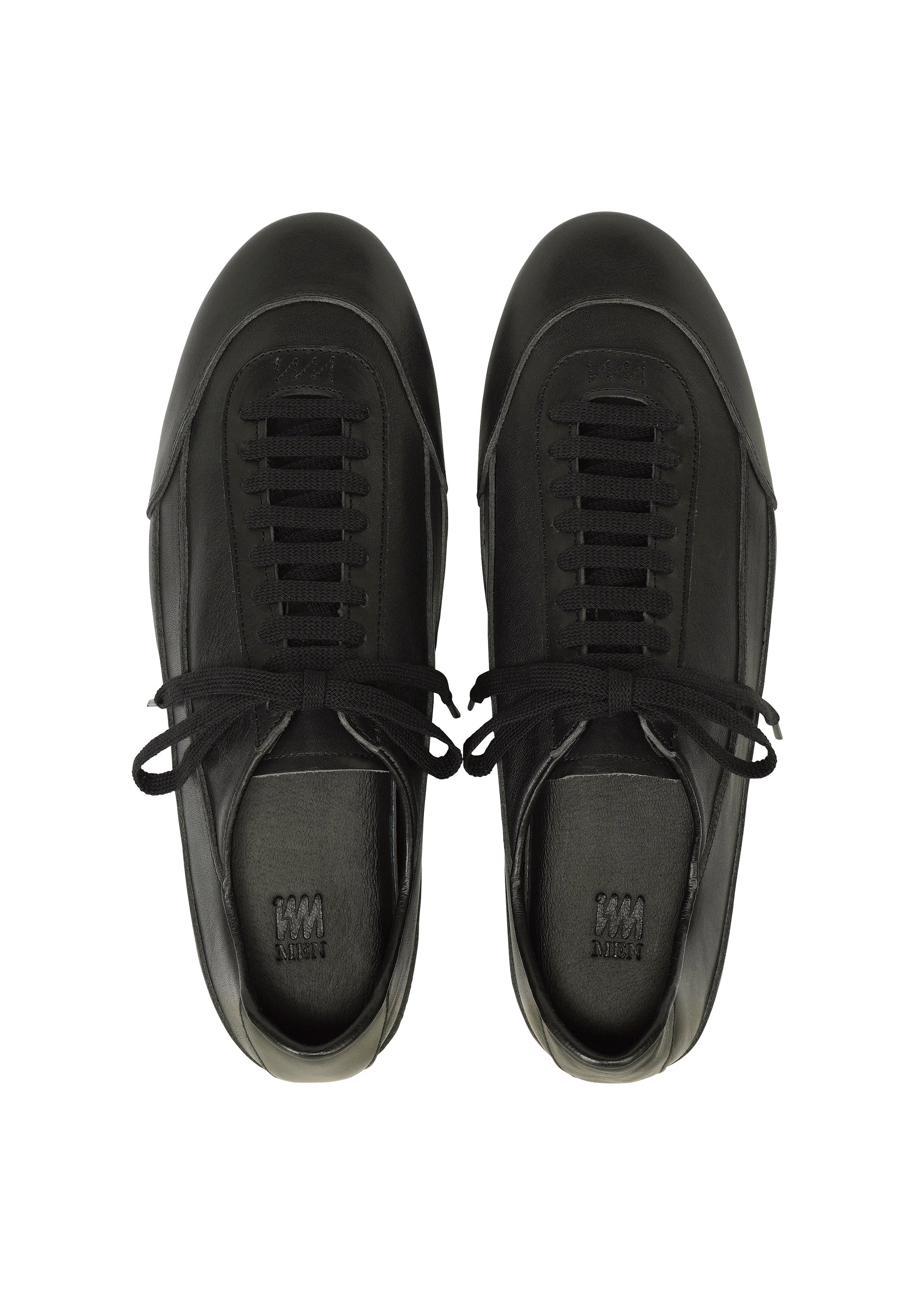 Zoomed view A pair of IM MEN FLIPPER black lace-up sneakers crafted from supple leather, photographed from above on a white background.