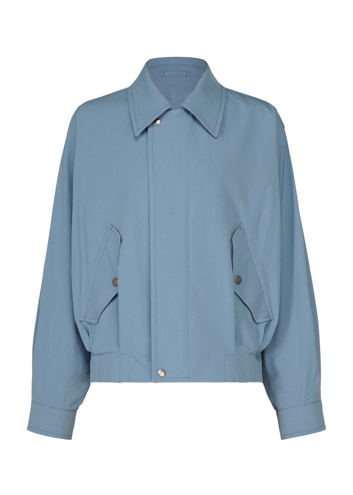 Introducing the COMFORT COTTON jacket by IM MEN: a light blue, long-sleeve organic cotton piece with a collar, front snap buttons, and two angled flap pockets. Made from high-twist cotton for a crisp texture, this jacket boasts a slightly cropped, boxy silhouette with cuffed sleeves and a minimalist design. view 2 of 8