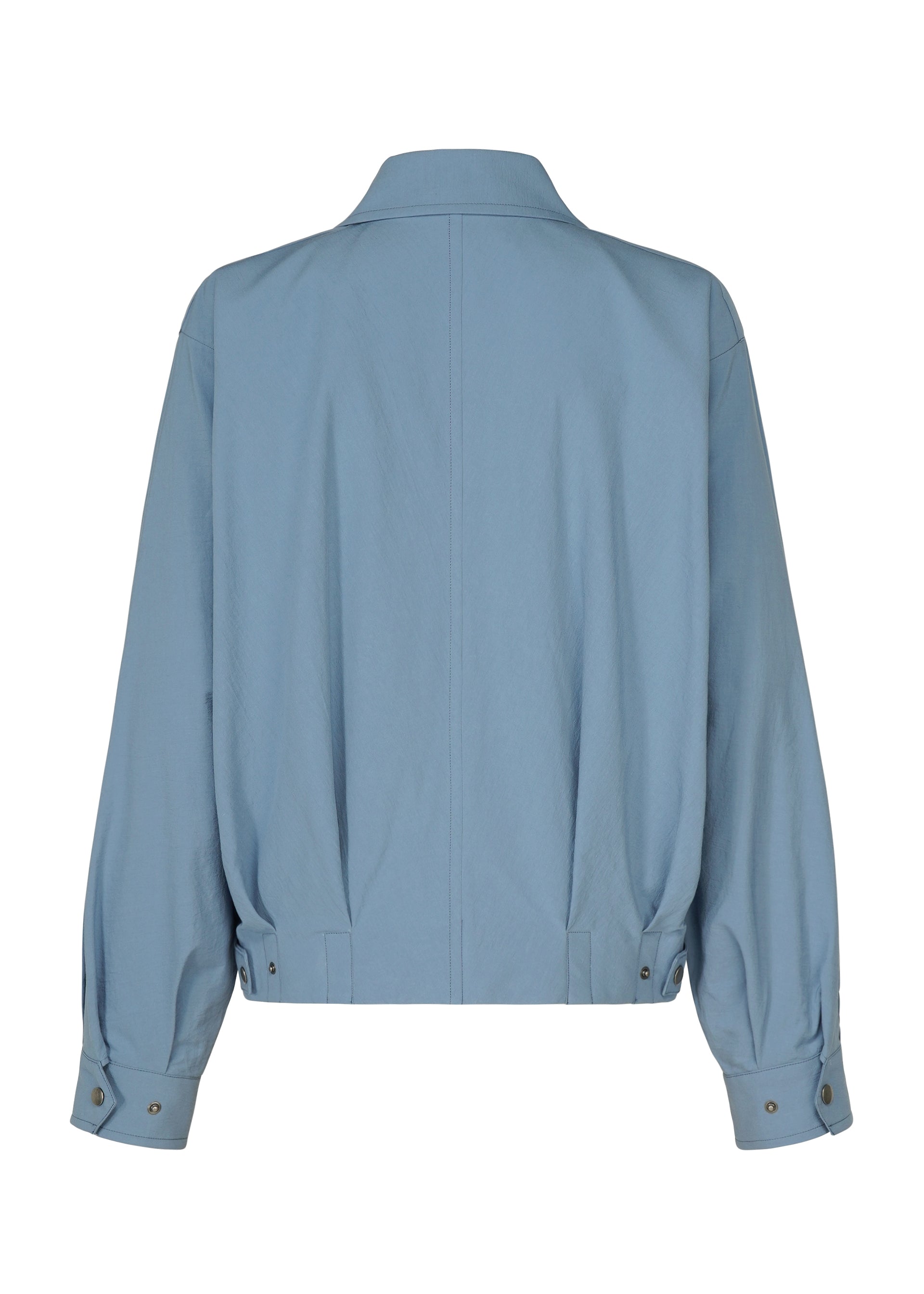 Zoomed view The COMFORT COTTON jacket by IM MEN is crafted from high-twist organic cotton in light blue. Designed with long sleeves, this jacket is shown from the back, showcasing its crisp, smooth texture. It features a collar, buttoned cuffs, and adjustable waist tabs secured with metal snaps for a refined finish.
