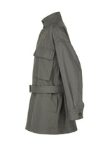 Side view of the TOUGH WOOL COTTON field jacket by IM MEN in olive green, crafted from Bishu wool blended yarn with a standing collar, flap chest pocket, waist belt, and buttoned cuffs, displayed on a white background.
