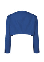 A royal blue, long-sleeved, collarless SHRINK WOOL jacket by IM MEN in a crepe-look finish, cropped and shown from the back on a plain white background with no visible fastenings or embellishments.