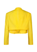 The GRADATION WOOL jacket by IM MEN features bright yellow dyed wool, long sleeves, a back buckle detail, and buttoned cuffs. Shown from the back against a white background, Autumn Winter 2026/27 collection.