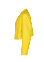 Bright yellow GRADATION WOOL women’s blazer by IM MEN, shown from the side with long sleeves and a tailored fit, inspired by Autumn Winter 2026/27, set against a plain white background.