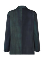 A dark green and navy blue GRADATION WOOL jacket by IM MEN, shown from the back with a subtle two-tone split and long sleeves—a unique dye technique for Autumn Winter 2026/27.