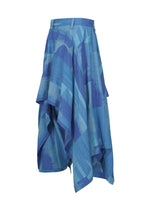IM MEN’s KASURI skirt is a blue asymmetric midi featuring an abstract light blue brushstroke pattern inspired by traditional Kasuri weaving, with layered draped panels and a fitted waistband with belt loops.