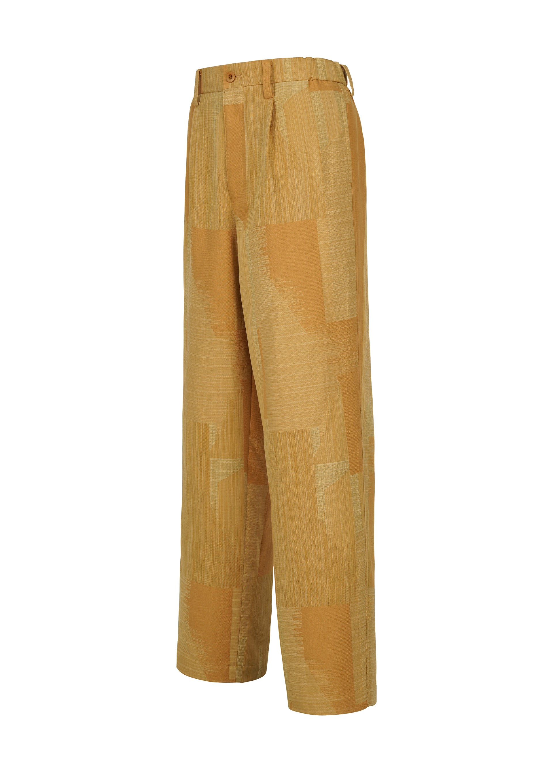 Zoomed view Discover the KASURI pants by IM MEN: wide-leg trousers in a light brown and beige patchwork motif, highlighted with a button closure and pleated front. Expertly crafted to showcase the artistry of traditional Kasuri weaving, these pants add rich texture and refined artisanal detail. Presented at a slight angle against a clean white background.