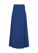 The SHRINK WOOL by IM MEN is a long, high-waisted royal blue A-line skirt in hard-twist wool with subtle pleats and a wide waistband, shown on a white background. - BLUE （no.72）