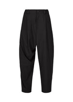 The COTTON YAK pants from IM MEN feature a black, loose-fitting cropped design crafted in cotton yak, highlighted by a dropped crotch, pleated front, belt loops, and a button closure for a relaxed silhouette. Presented against a plain white background, these pants are part of the IM MEN Autumn Winter 2026/27 Collection. - BLACK （no.15）