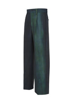 IM MEN’s GRADATION WOOL features wide-leg worsted wool pants with a high waist, deep pleats, a green and black gradient pattern, belt loops, button closure, and side pockets.