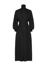 CLAY by IM MEN is a long-sleeve black dress featuring a high collar, fitted cuffs, and a tailored waist. Made from rib knit fabric, this ankle-length dress boasts a structured, minimalist silhouette and a concealed front closure—a refined piece inspired by the IM MEN Autumn Winter 2026/27 collection.