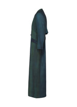 The GRADATION WOOL coat by IM MEN features a long, dark green and blue gradient in worsted wool, shown side view against a white background with a structured collar and long sleeves.