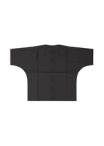 The IM MEN COMPACT SHIRT BLACK is a traditional Japanese kimono-style garment with wide sleeves, a straight open front with buttons and tie closures at the collar, and a subtle geometric pattern.