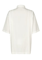 The IM MEN CLAY SHIRT is a relaxed-fit, short-sleeved cotton shirt in plain white, shown from the back with a simple collar and no visible buttons or patterns.
